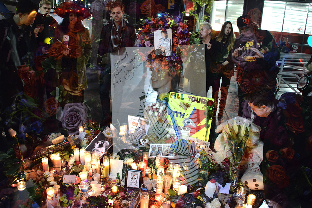 HOLLYWOOD, CA - JANUARY 11: (EDITORS NOTE: Image was created using multiple exposure in camera) David Bowie remembered on The Hollywood Walk of Fame on January 11, 2016 in Hollywood, California. Araya Diaz/Getty Images/AFP
