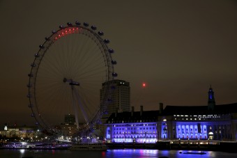 The London Eye is shown during Earth Hour in London, Britain March 19, 2016. REUTERS/Neil Hall