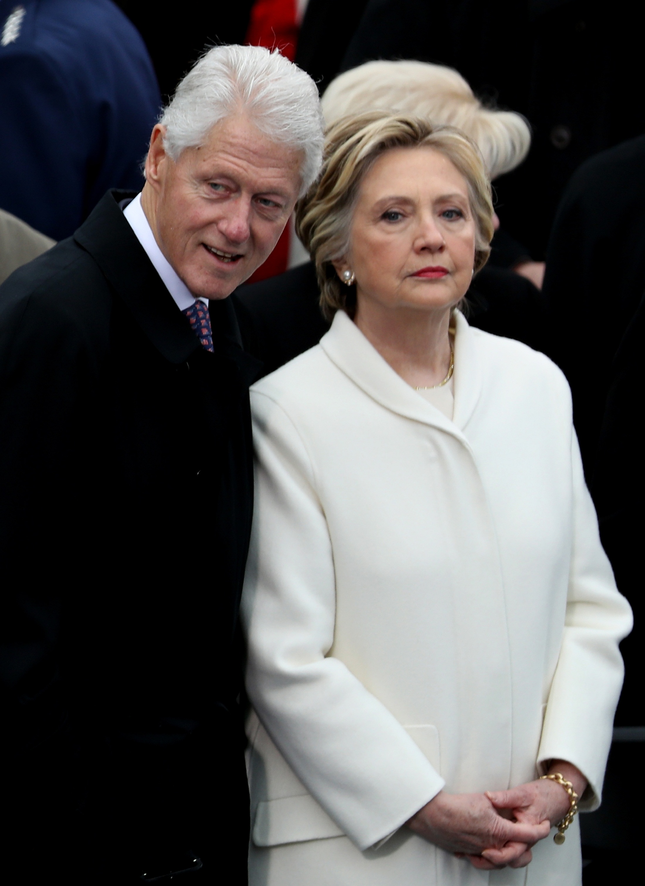WASHINGTON, DC - JANUARY 20: Former President Bill Clinton and former Democratic presidential nominee Hillary Clinton stand on the West Front of the U.S. Capitol on January 20, 2017 in Washington, DC. In today's inauguration ceremony Donald J. Trump becomes the 45th president of the United States.   Joe Raedle/Getty Images/AFP